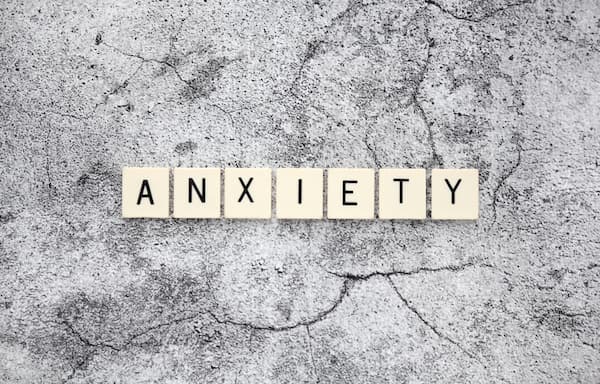 anxiety written with tiles, compensation for anxiety after a car accident concept