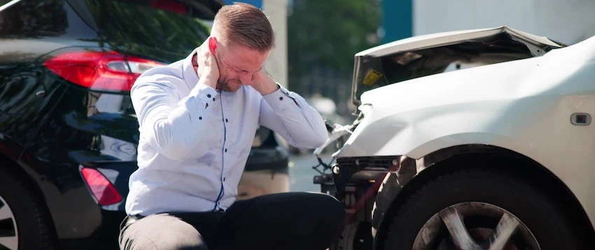 A man is in pain after a car accident in Metro Atlanta.