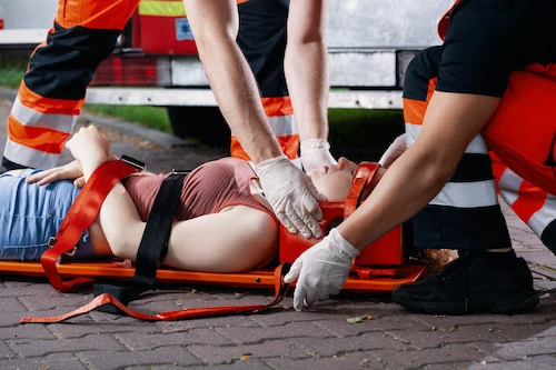 car accident victim with a back injury on a stretcher