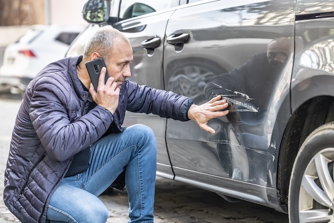 Man on Phone After Accident